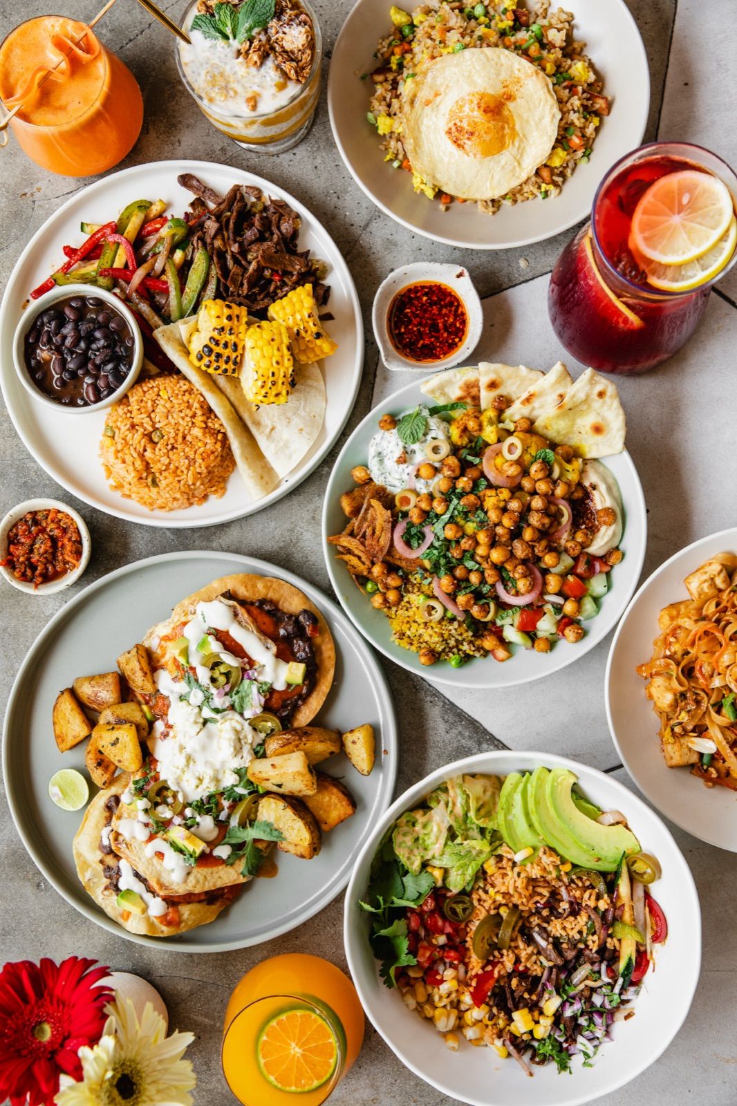 An overhead spread of dishes and drinks